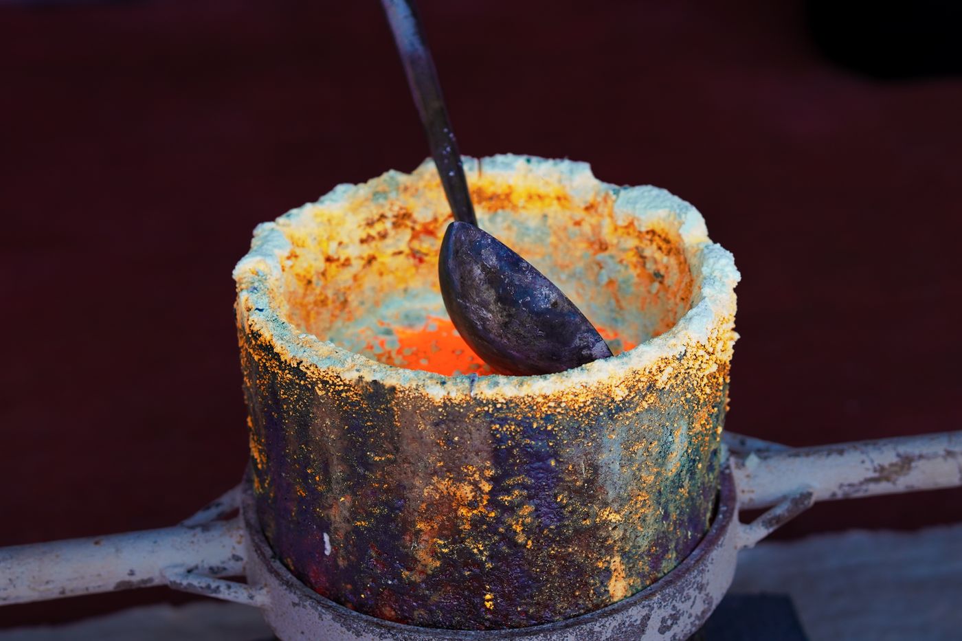 Molten gold during refinery assay and testing