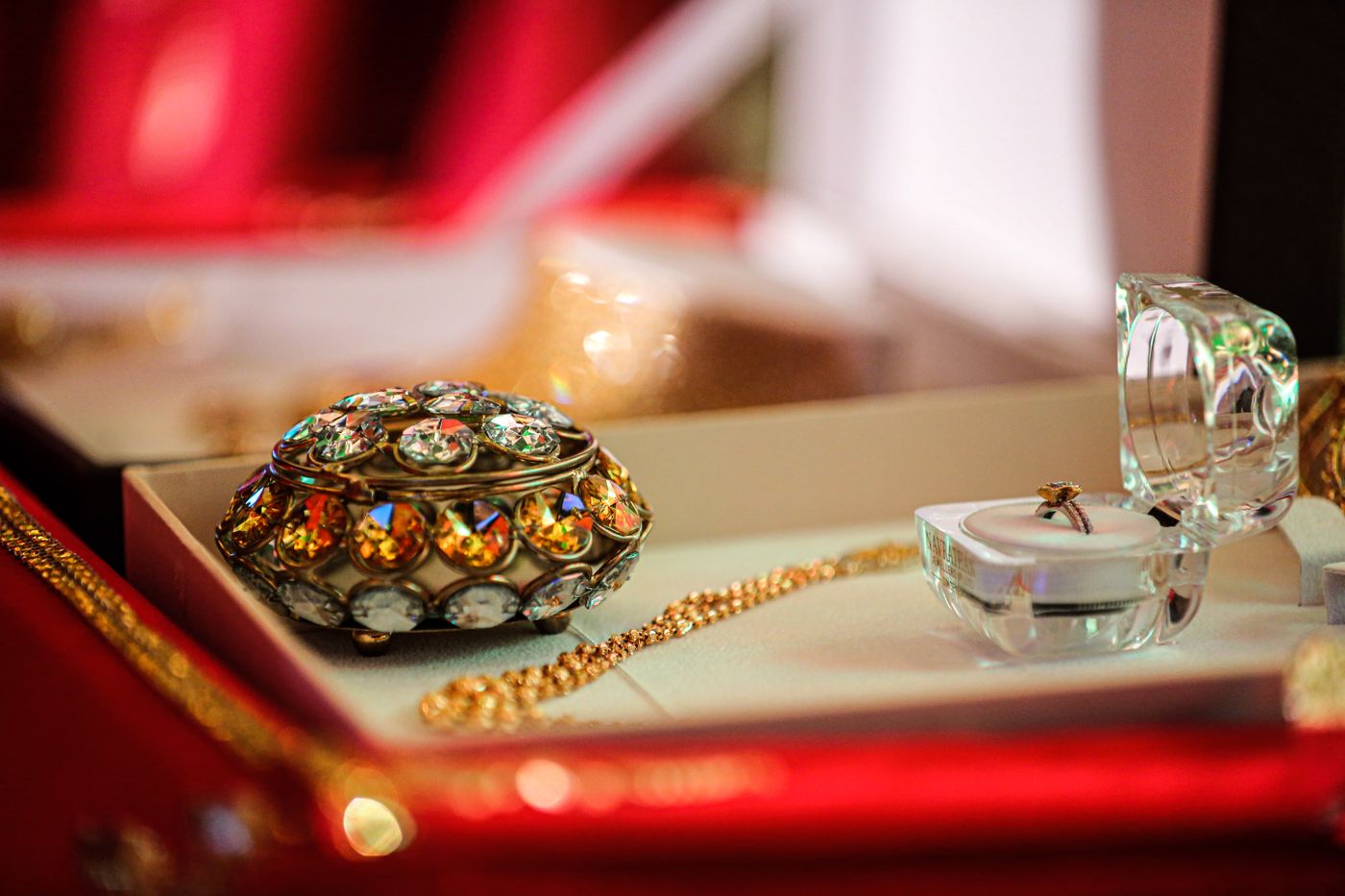 Gold jewellery pieces in a presentation box