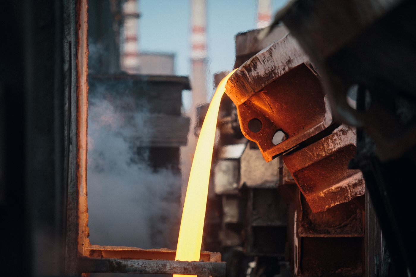 Molten gold being poured during refinery processing
